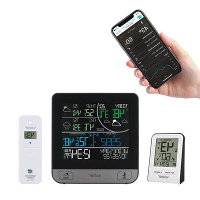 1684344 C74443 Weather Station Bundle with display, outdoor temperature and humidity sensor, bonus station, and phone showing the La Crosse View app.